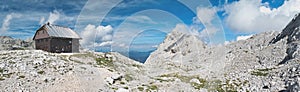 Panorama of Dom Valentina Stanica mountain hut with Rjavina mountain in Julian Alps photo