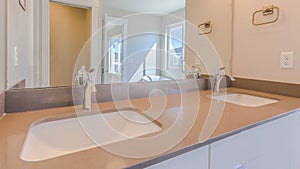 Panorama Double sink vanity inside the modern bathroom of a new house