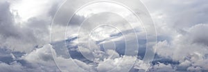 Panorama of dramatic rainy sky with gray clouds