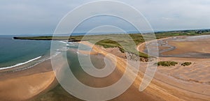 Panorama drone landscape view of the beautiful golden sand beach at Lacken Strand on the coast of North Mayo in Ireland