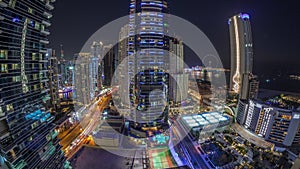 Panorama of the Dubai Marina and JBR area and the famous Ferris Wheel aerial day to night timelapse