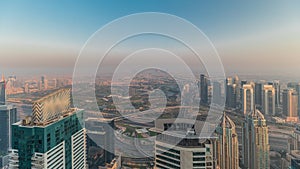 Panorama of Dubai Marina with JLT skyscrapers and golf course timelapse, Dubai, United Arab Emirates.