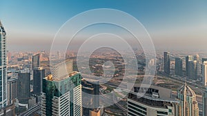 Panorama of Dubai Marina with JLT skyscrapers and golf course timelapse, Dubai, United Arab Emirates.