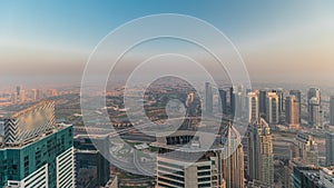 Panorama of Dubai Marina with JLT skyscrapers and golf course timelapse, Dubai, United Arab Emirates.