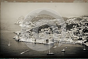 Panorama of Dubrovnik old city with many boats in front