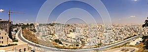 Panorama of East Jerusalem suburb and a West Bank town
