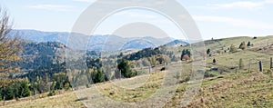 Panorama of ehtnic village in Carpathian Mountains, Ukraine photo