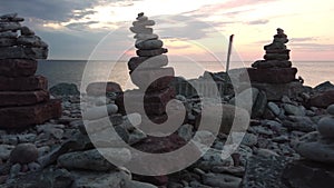 Panorama of the embankment with stone figures stacked on it Byxelkrok, Sweden