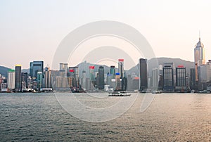 Panorama of the evening city of Hong Kong with skyscrapers.