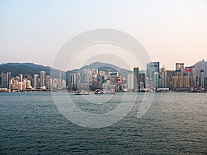 Panorama of the evening city of Hong Kong with skyscrapers.