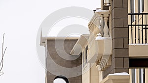 Panorama Exterior of apartments with snowy hill and cloudy sky backgound in winter