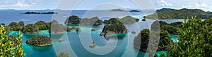 Panorama Fam Islands, Piaynemo, Raja Ampat, West Papua, Indonesia. Blue lagoon, green Islets, tropical paradise