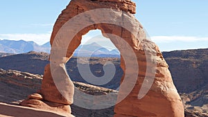 Panorama of famous fiery red orange rock sandstone delicate arch in arches park