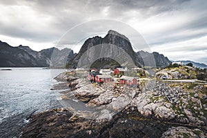 Panorama of famous tourist attraction Hamnoy fishing village on Lofoten Islands near Reine, Norway with red rorbu houses