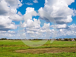 Panorama of farmland and village of Oudeschild on Frisian islan