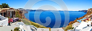 Panorama of Fira, modern capital of the Greek Aegean island, Santorini, with caldera and volcano, Greece