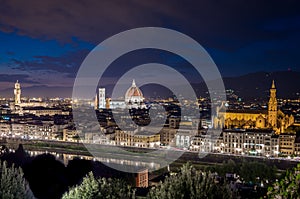 Panorama of Florence with Duomo Santa Maria Del Fiore, tower of Palazzo Vecchio at night in Florence, Tuscany, Italy