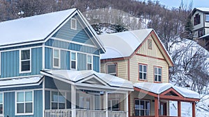 Panorama frame Beautiful homes in Park City Utah sitting on a hill covered with snow in winter