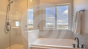 Panorama frame Built in square bathtub inside a bathroom with white wall and sliding window