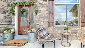 Panorama frame Comfortable wicker chairs on a veranda day light