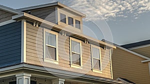 Panorama frame Sash windows in the upper floor of a timber house