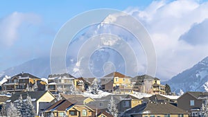 Panorama frame Scenic town with unobstructed view of towering snowy peaks of Wasatch Mountain