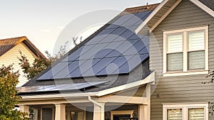 Panorama frame Solar photovoltaic panels on a house roof