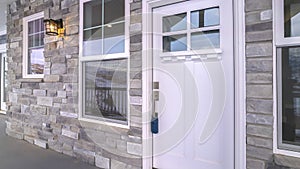 Panorama frame White wooden front door with sash windows