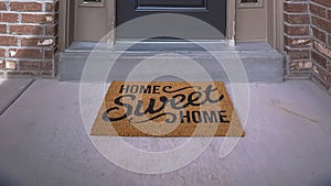 Panorama frame Wreath and doormat on the front door with sidelights and transom window