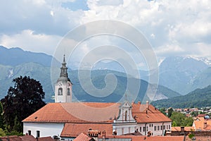 Panorama of a franciscan monastery, franciskanski samostan kamnik, with its iconic clock tower. it is a baroque monastery