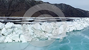 Panorama of frozen Lake Baikal. A wall of ice hummocks.
