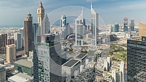 Panorama of futuristic skyscrapers in financial district business center in Dubai on Sheikh Zayed road timelapse