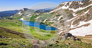 Panorama of Gardner Lake, Beartooth Pass. Peaks of Beartooth Mountains, Shoshone National Forest, Wyoming, USA. photo