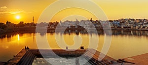 Panorama of Ghats at Pushkar lake on sunset in Rajasthan. India