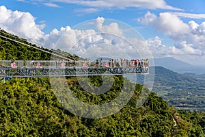 Panorama glass bridge. Rainforest cultural tourism zone Yanoda, Hainan island, Yalong Bay Tropical Paradise Forest Park next to
