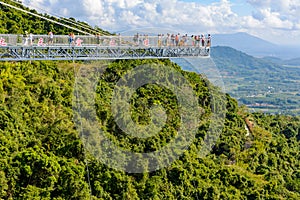 Panorama glass bridge. Rainforest cultural tourism zone Yanoda, Hainan island, Yalong Bay Tropical Paradise Forest Park next to