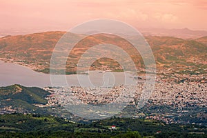 Panorama of the Greek city of Volos at sunset. Volos Greece. View from the mountain on the Volos