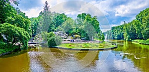 Panorama of green banks of Ionian Sea lake in Sofiyivka Park, Uman, Ukraine