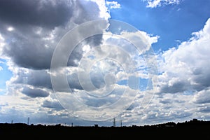 Panorama of grey clouds and industrial skyline