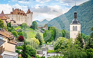 Panorama of Gruyeres medieval village with the castle houses and Saint Theodule church bell tower in La Gruyere Switzerland