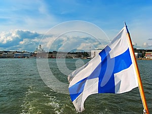 Panorama of Helsinki with Finnish flag photo