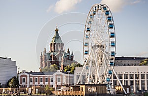 Panorama of Helsinki with the Uspenski Cathedral and SkyWheel on a summer day