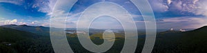 Panorama of hills covered in greenery with the lake Jocassee on the background in South Carolina