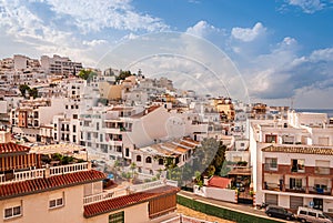 Panorama of hillside houses and apartments at the sunny Costa Tropical town of La Herradura, Granada, Spain