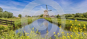 Panorama of historic windmill De Onrust in Noord-Holland photo