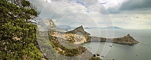 Panorama, horizontal view of bay, Crimean mountains with rocky c