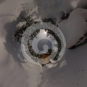 Panorama house chalet during a snowfall in the trees winter forest at night in the moonlight. Tiny planet 360 panorama