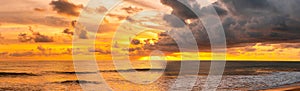 Panorama of how to set the sun, Beautiful glorious golden sunset above the sea in evening