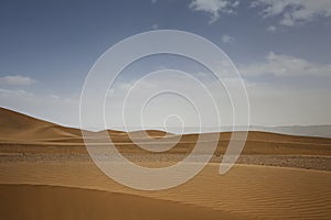 Huge dunes of the desert. Growth of deserts on Earth