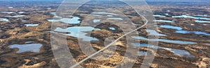 Panorama of Hundreds of small steppe multi-colored lakes in the delta of the Topar River,